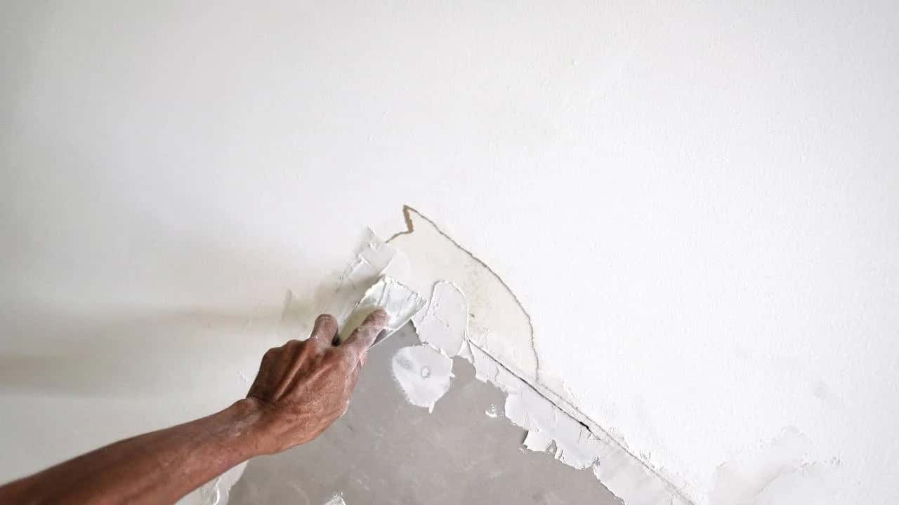 Drywall repair professional fixing walls in Vanier home