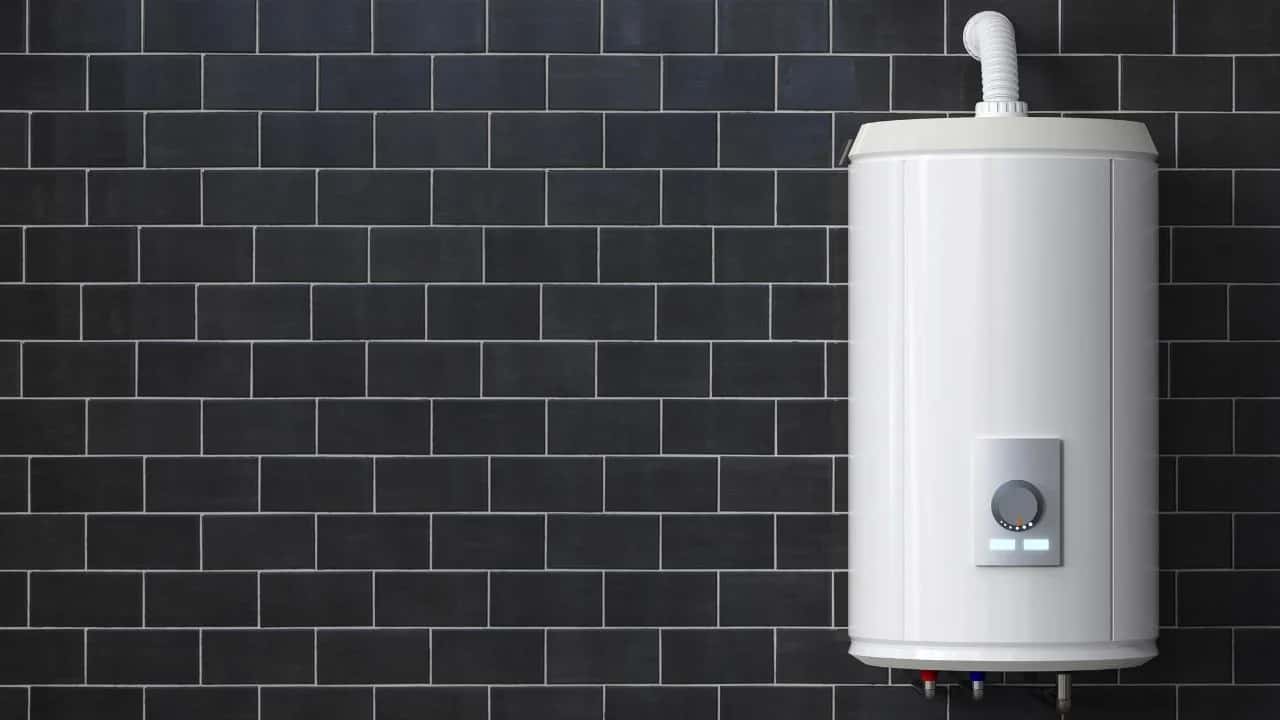 Professional installing new water heater in Ottawa home basement