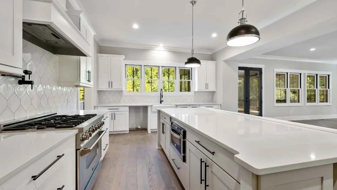 Beautiful newly renovated kitchen in Ottawa family home with modern cabinets and island
